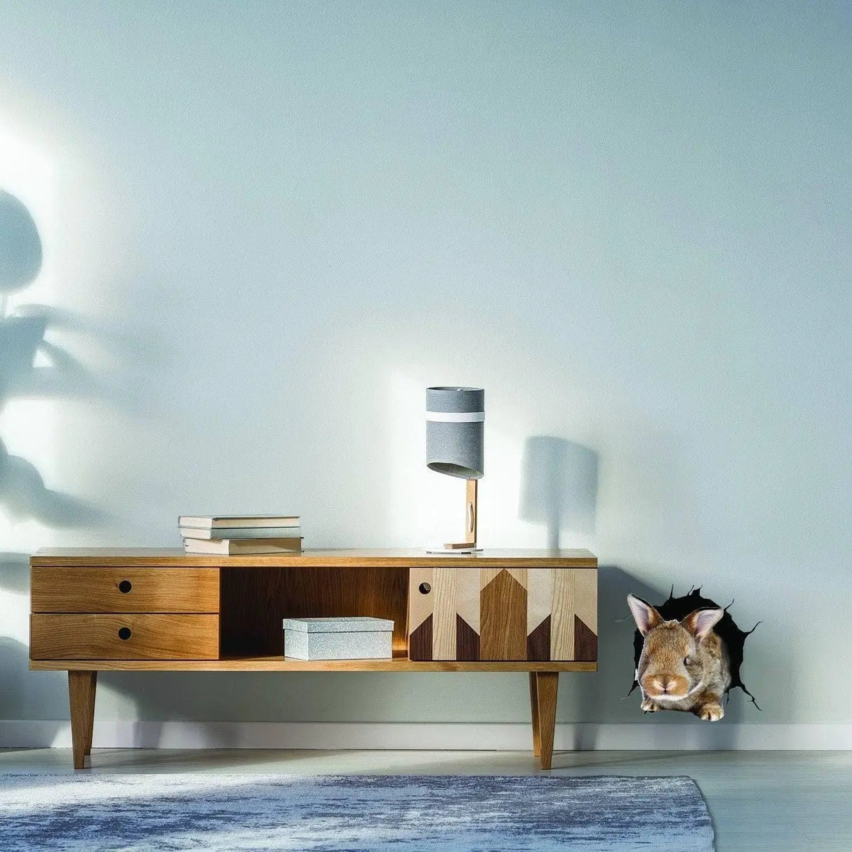 3D rabbit wall sticker design peeking through a wall, adding whimsy to kids room decor.
