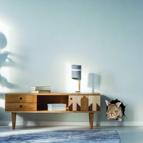3D rabbit wall sticker design peeking through a wall, adding whimsy to kids room decor.