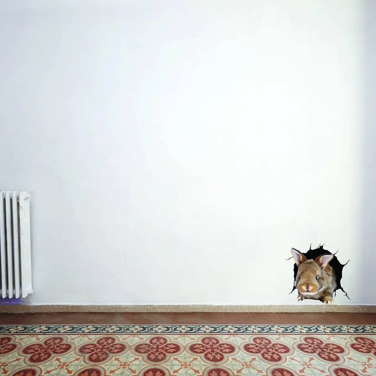 Realistic wall decal of a pig's face peeking through a hole in the wall, adding a fun decor element.