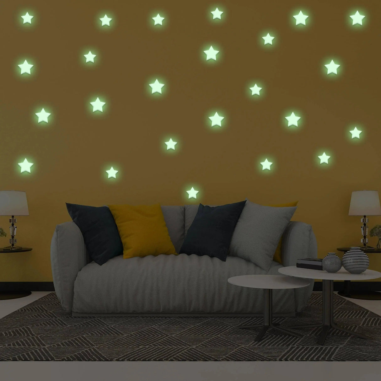 Glow in the dark star stickers on a wall above a cozy couch, creating a celestial scene in a child's room.