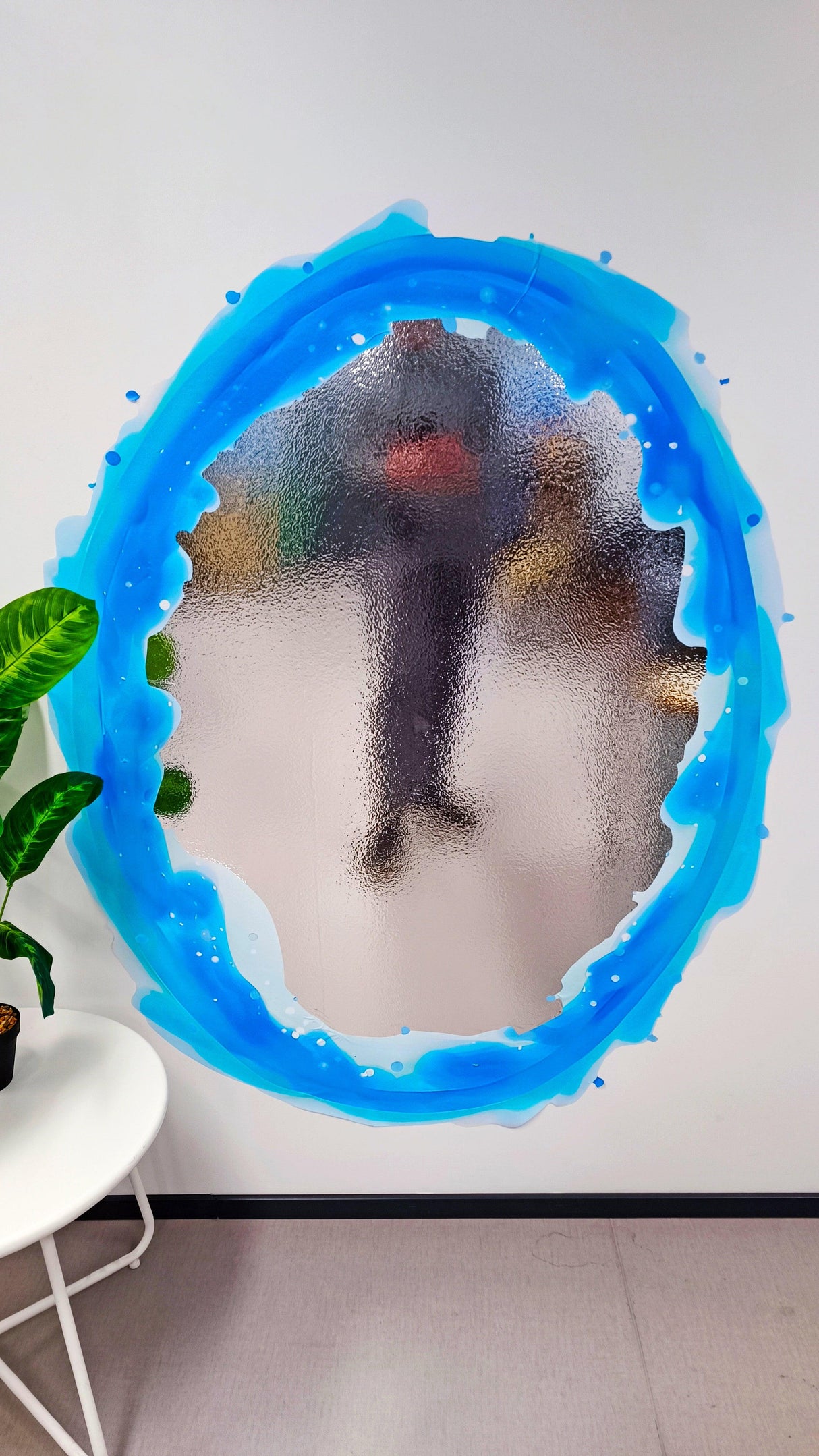 Blue portal aura wall sticker on a white wall, creating a vibrant, eye-catching decor effect.
