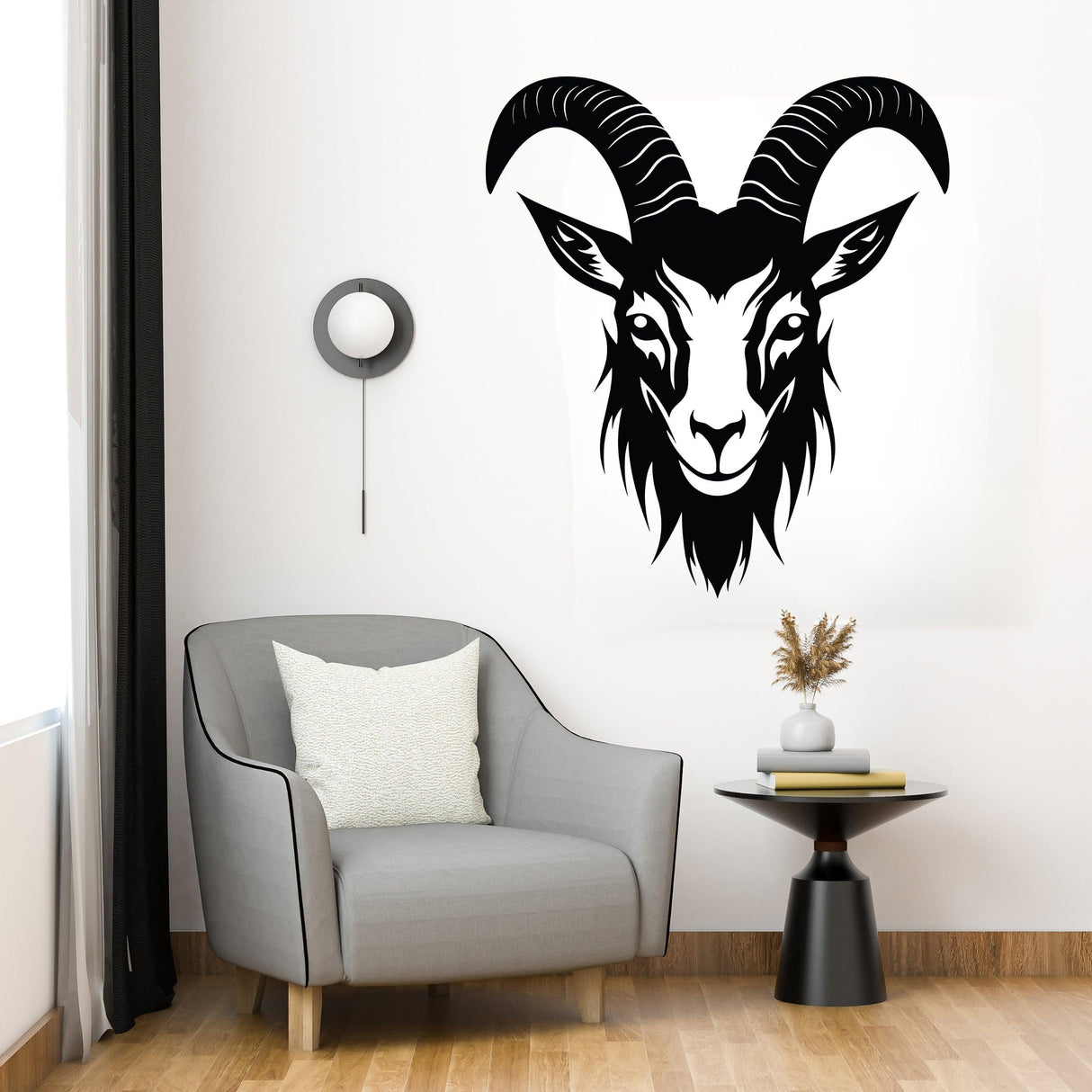 Bold black goat head silhouette wall sticker creating a striking focal point in a modern living room.