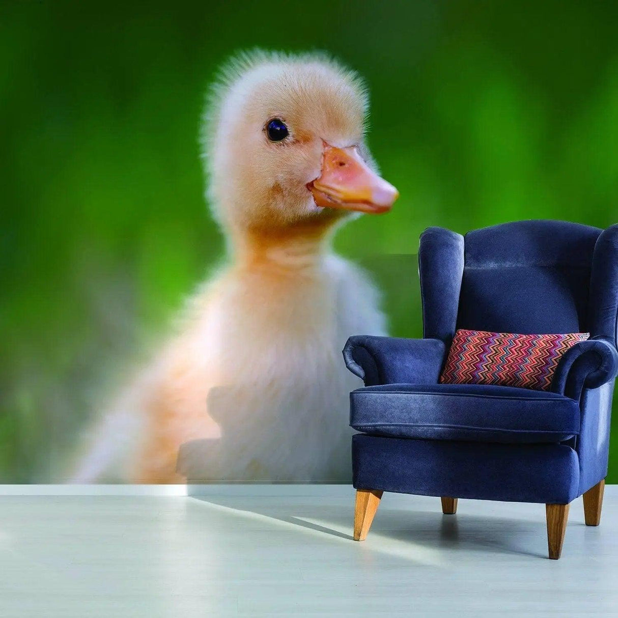 Adorable baby duck wall sticker in a cozy room setting with a stylish chair and green backdrop.