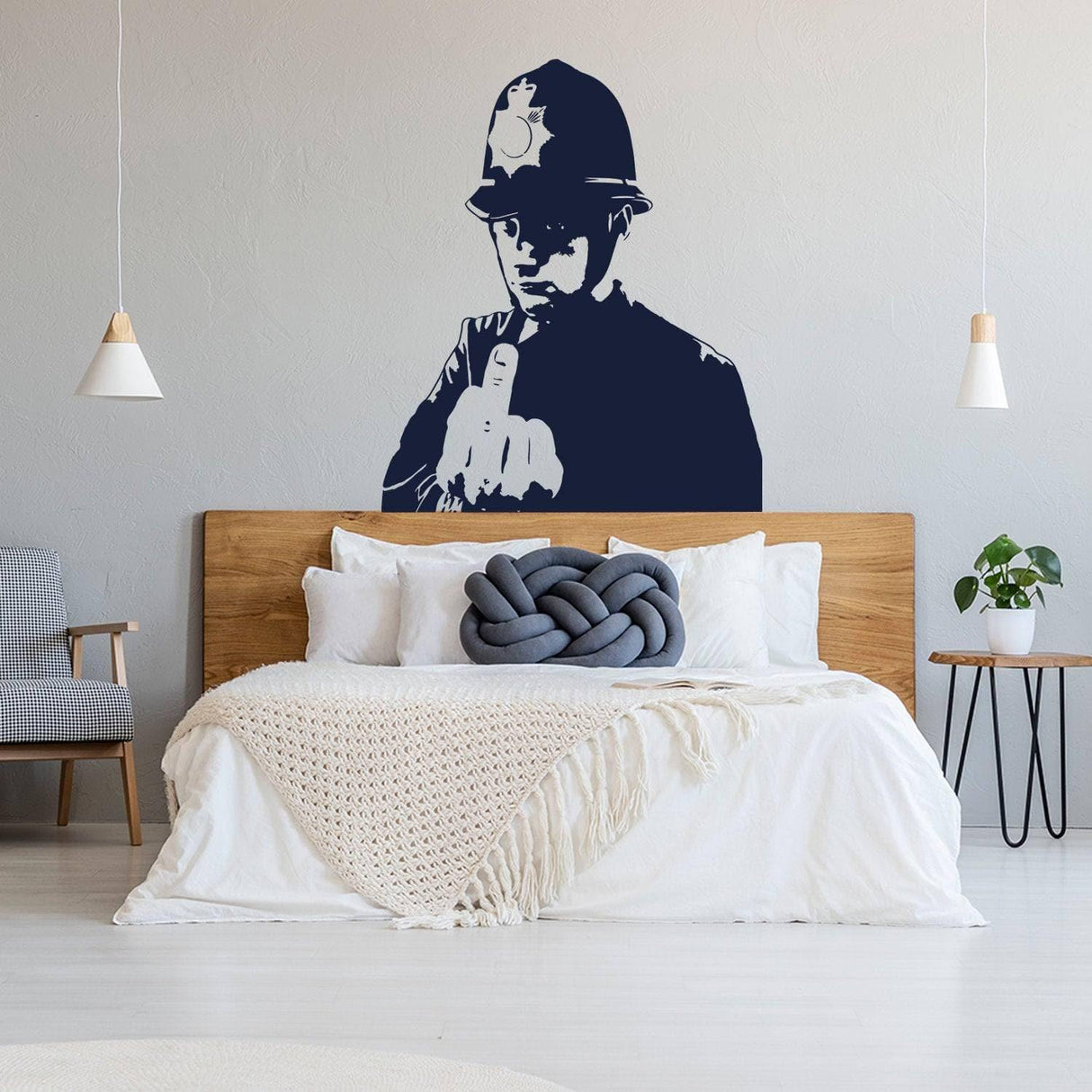 Urban Expression Scotland Yard cop wall decal in modern bedroom decor, adding urban art style to the space.