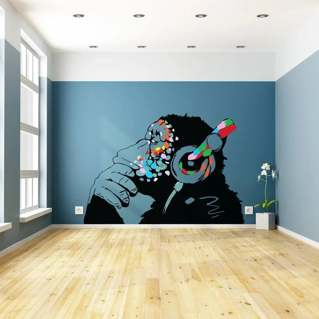 Banksy-inspired thinking monkey wall sticker in a modern interior with headphones, bright colors, and artistic flair.