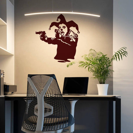 Joker clown wall decal in a modern workspace, featuring a figure pointing a gun, adding stylish street art decor.