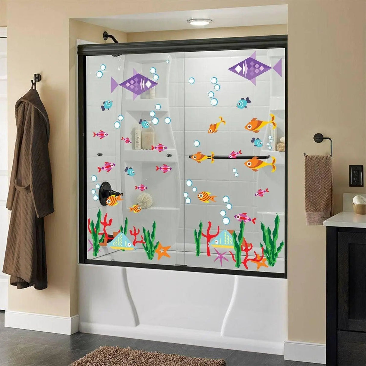 Colorful underwater scene vinyl decals on a shower door, featuring fish and bubbles for playful bathroom decor.