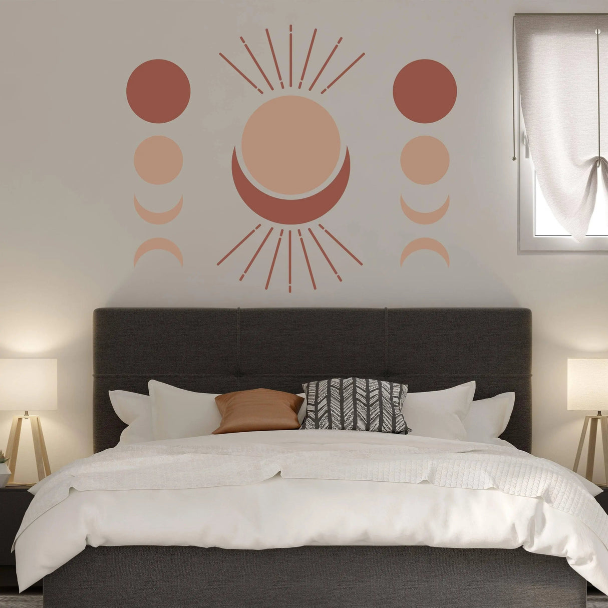 Bohemian moon phases wall art decal above a modern bed in a cozy bedroom with stylish decor.