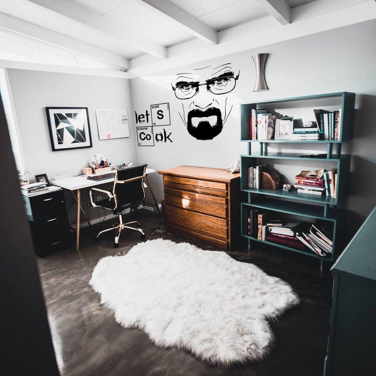 Stylish kitchen featuring a Breaking Bad themed wall decal that says 'Let's Cook' above a cozy study area.