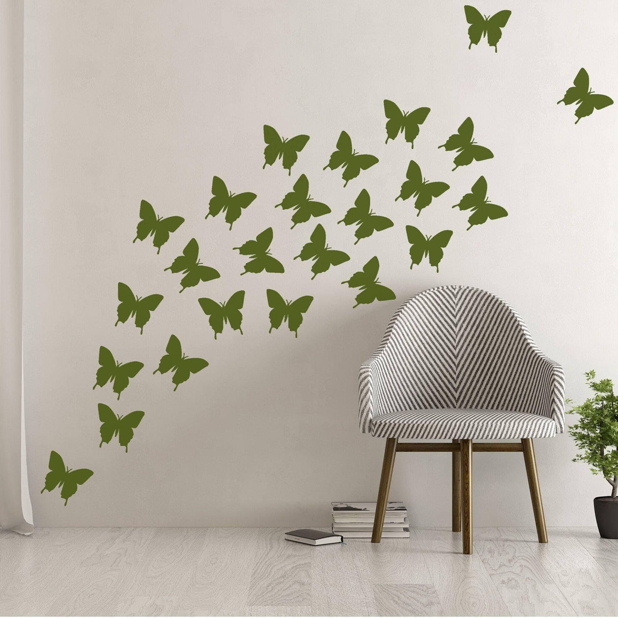 Green butterfly wall decals creating a captivating design above a stylish chair in a modern interior.