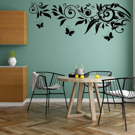 Butterflies and swirling vines wall art decal, perfect vinyl sticker for kids' room or playful home decor.
