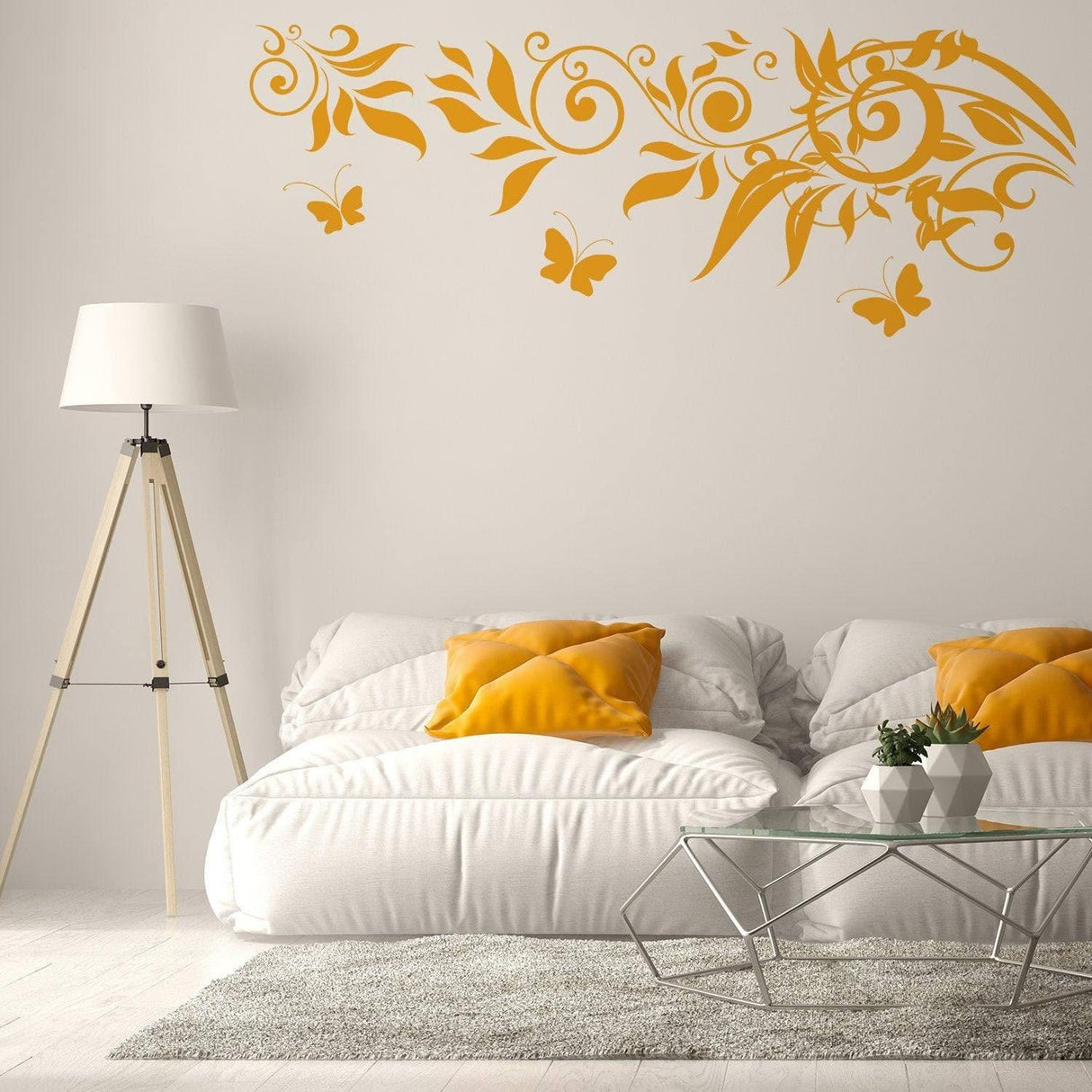 Whimsical yellow butterfly wall decal above a cozy sofa with pillows in a stylish living room setting.