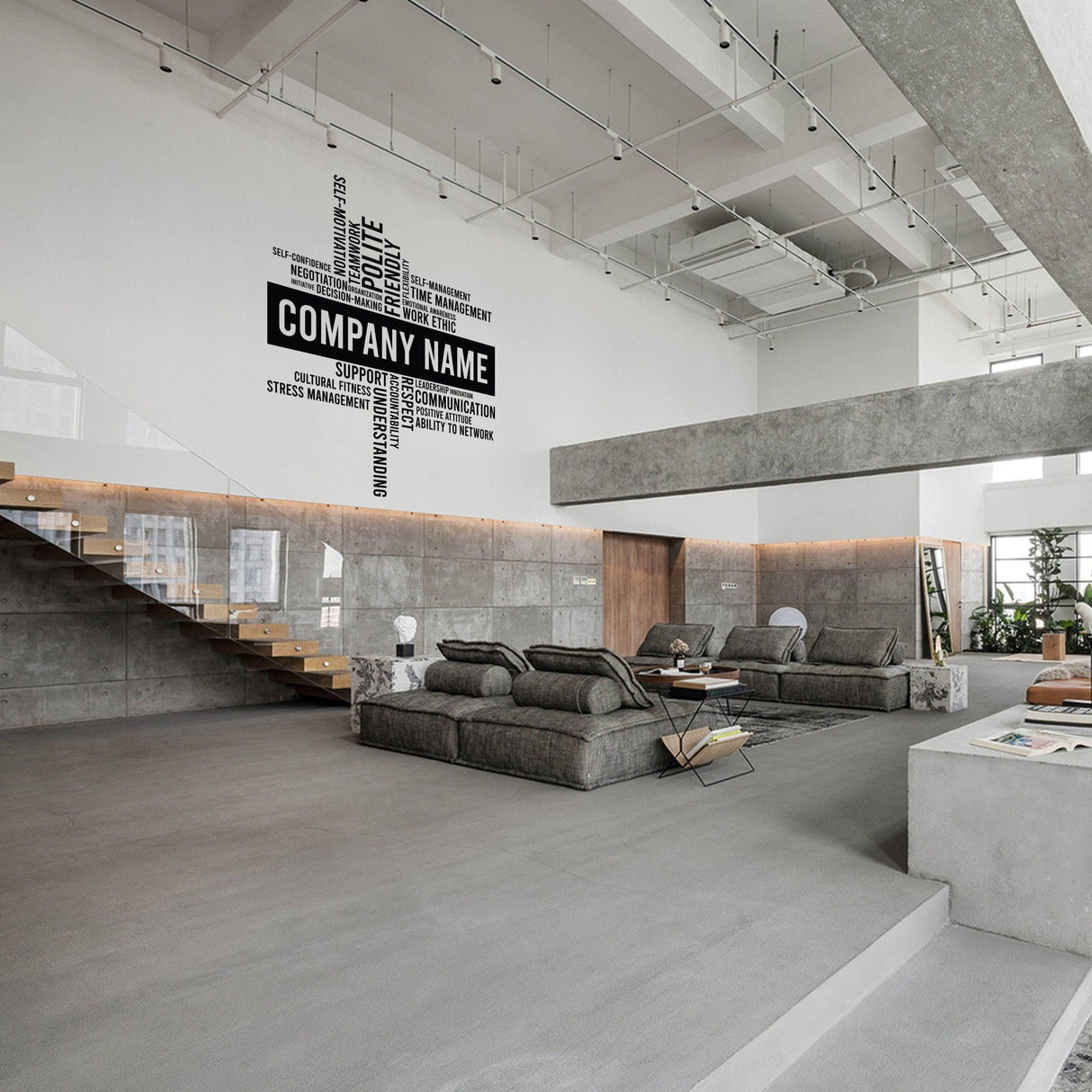 Modern office interior featuring a personalized company name wall decal, stylish furniture, and sleek design elements.