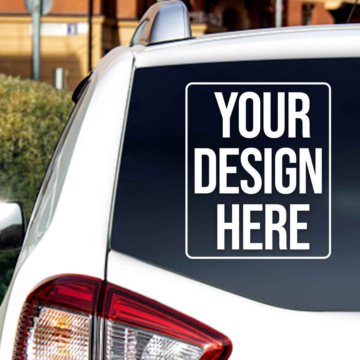 Personalized car window decal displaying placeholder text "YOUR DESIGN HERE" for custom auto stickers.