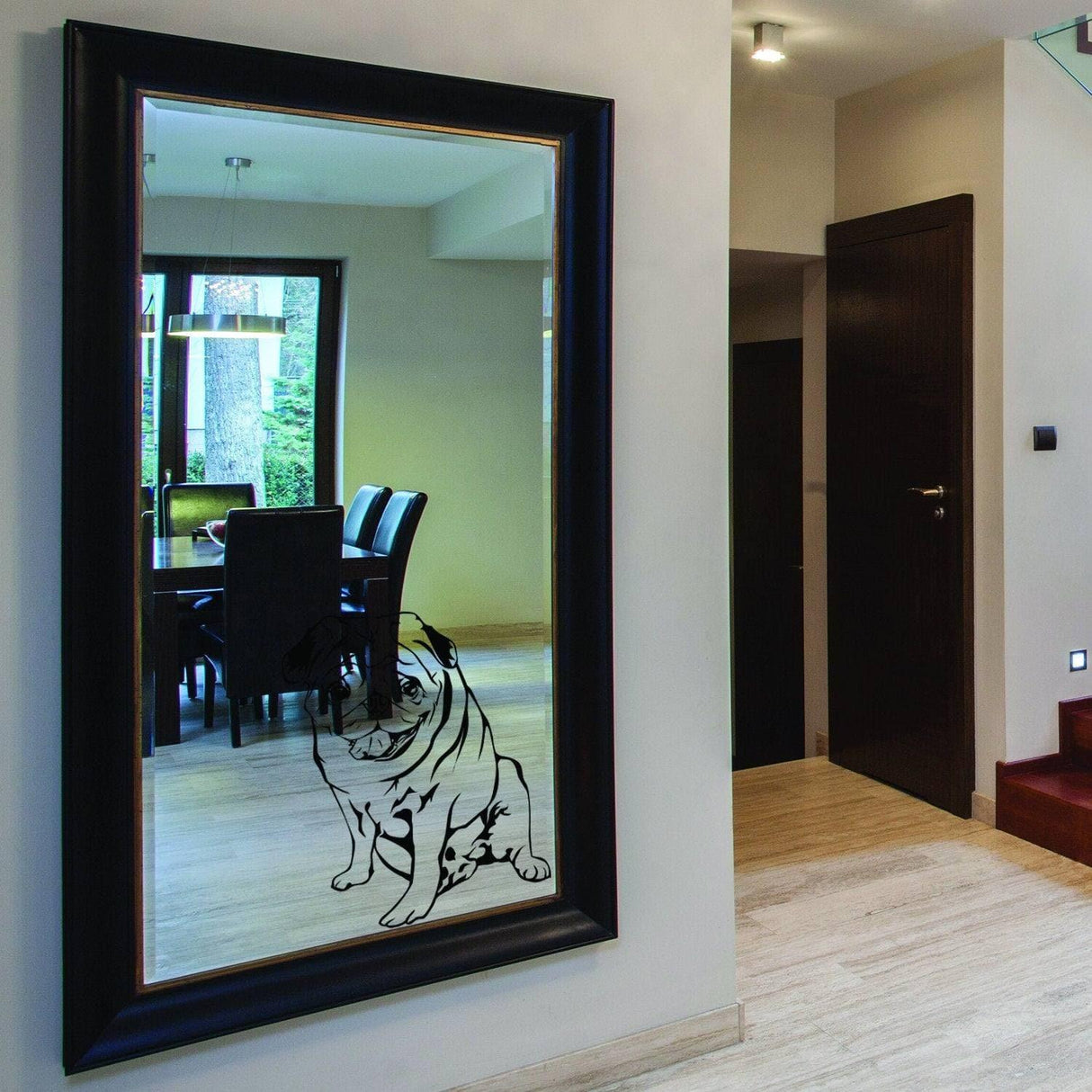 Customizable vinyl pet portrait decal of a pug on a mirror in a modern home interior.
