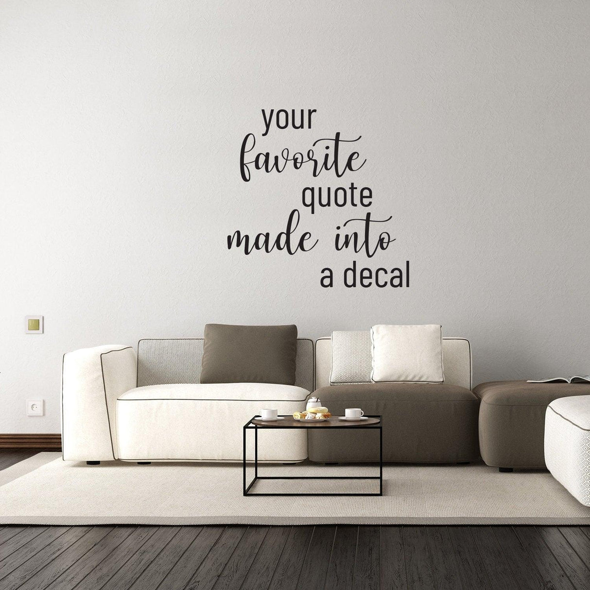 Custom vinyl wall decal featuring the phrase 'your favorite quote made into a decal' on a living room wall.