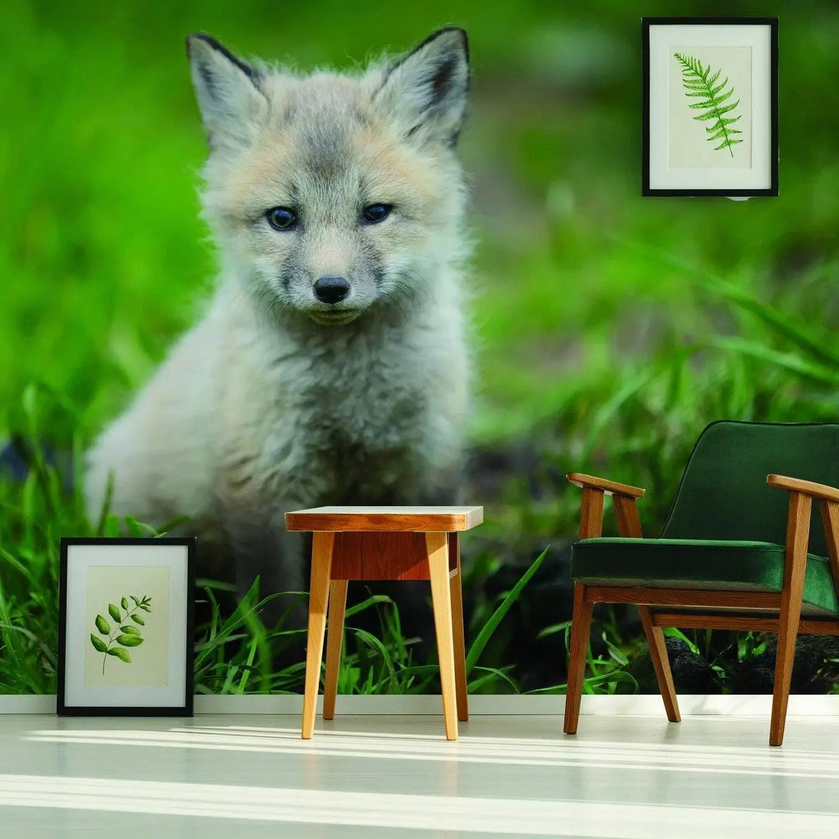 Whimsical fox wall art in a nursery setting, featuring a cute baby fox on green grass.