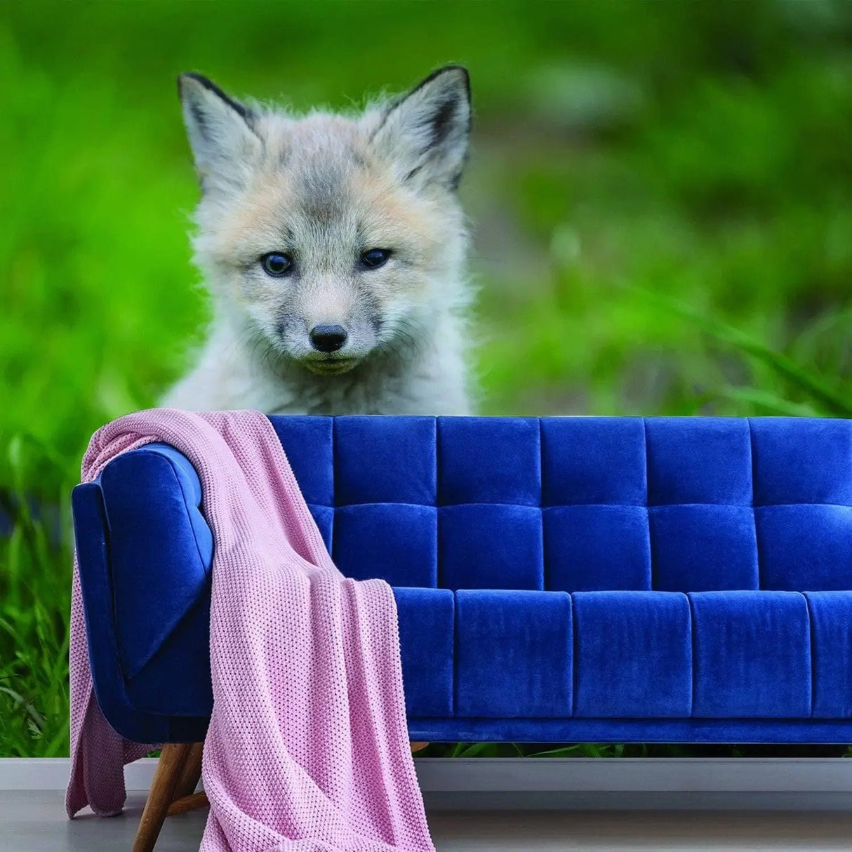 Whimsical fox wall art mural in a nursery, featuring a cute fox against a lush green background.