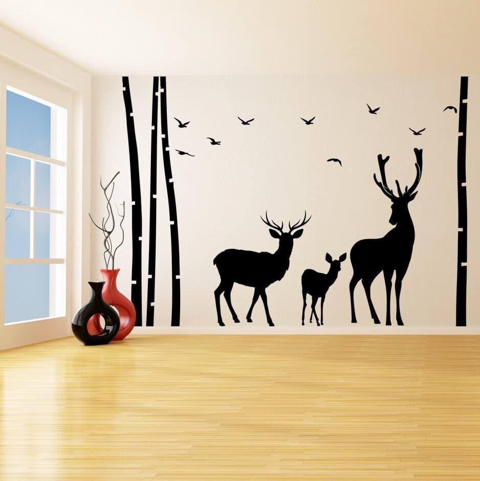 Nature-inspired wall decal featuring deer and trees for a serene home decor.