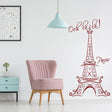 Eiffel Tower wall decal in a chic room with pink chair, adding a Parisian touch to indoor decor.