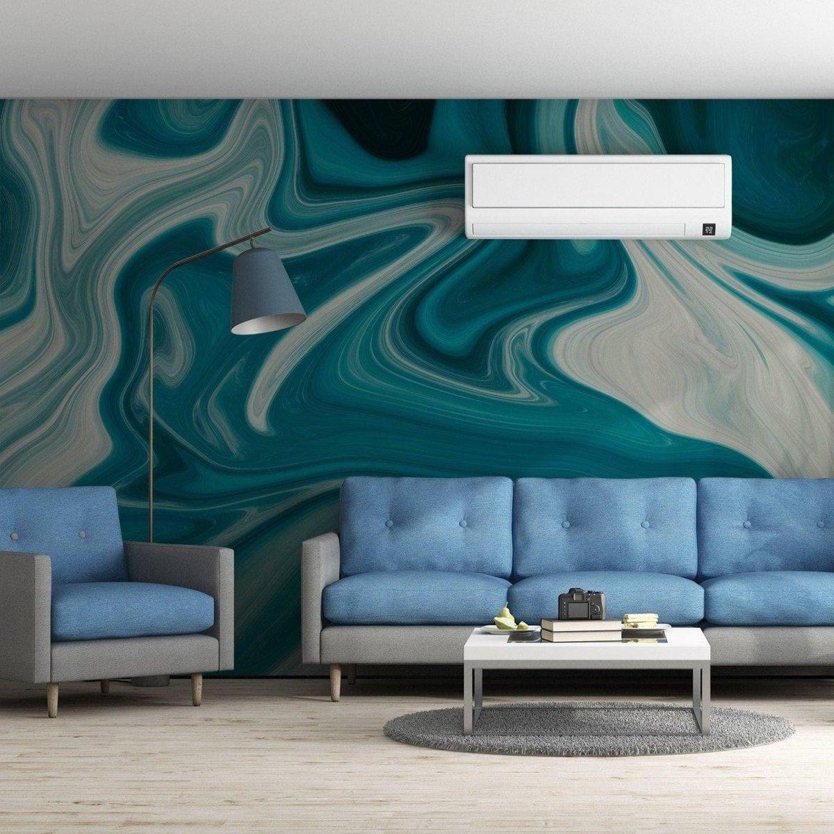 Elegant marble self-adhesive wallpaper in a modern living room with blue sofas and stylish décor.