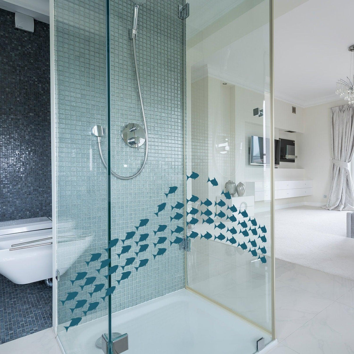 Underwater oasis wall decal set featuring fish stickers in a modern bathroom shower.