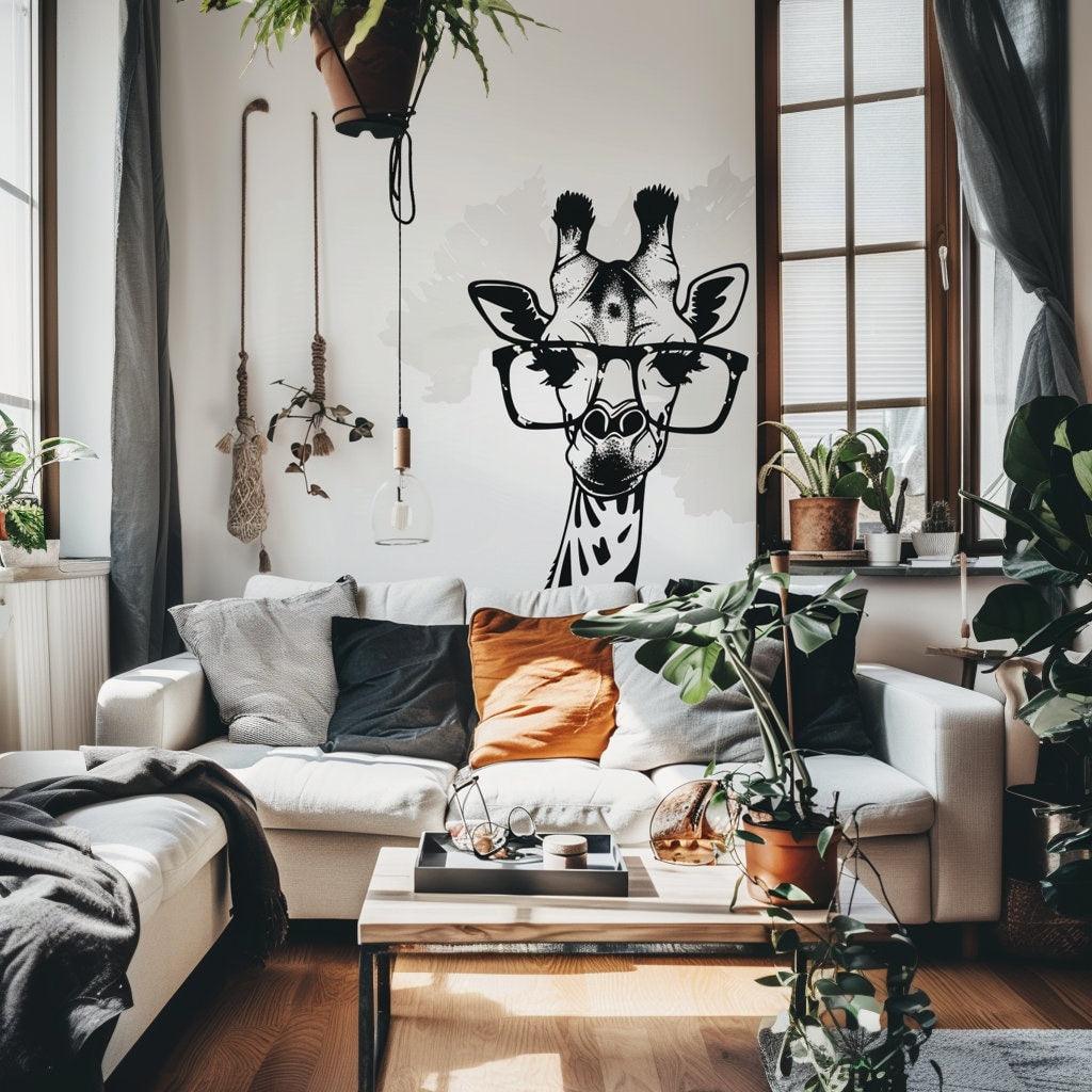 Stylish monochrome giraffe wall sticker with glasses in modern living room decor, featuring chic plants and cozy couch.