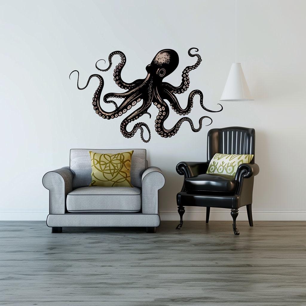 Elegant black octopus wall sticker above a modern gray sofa and black armchair in a stylish living room.