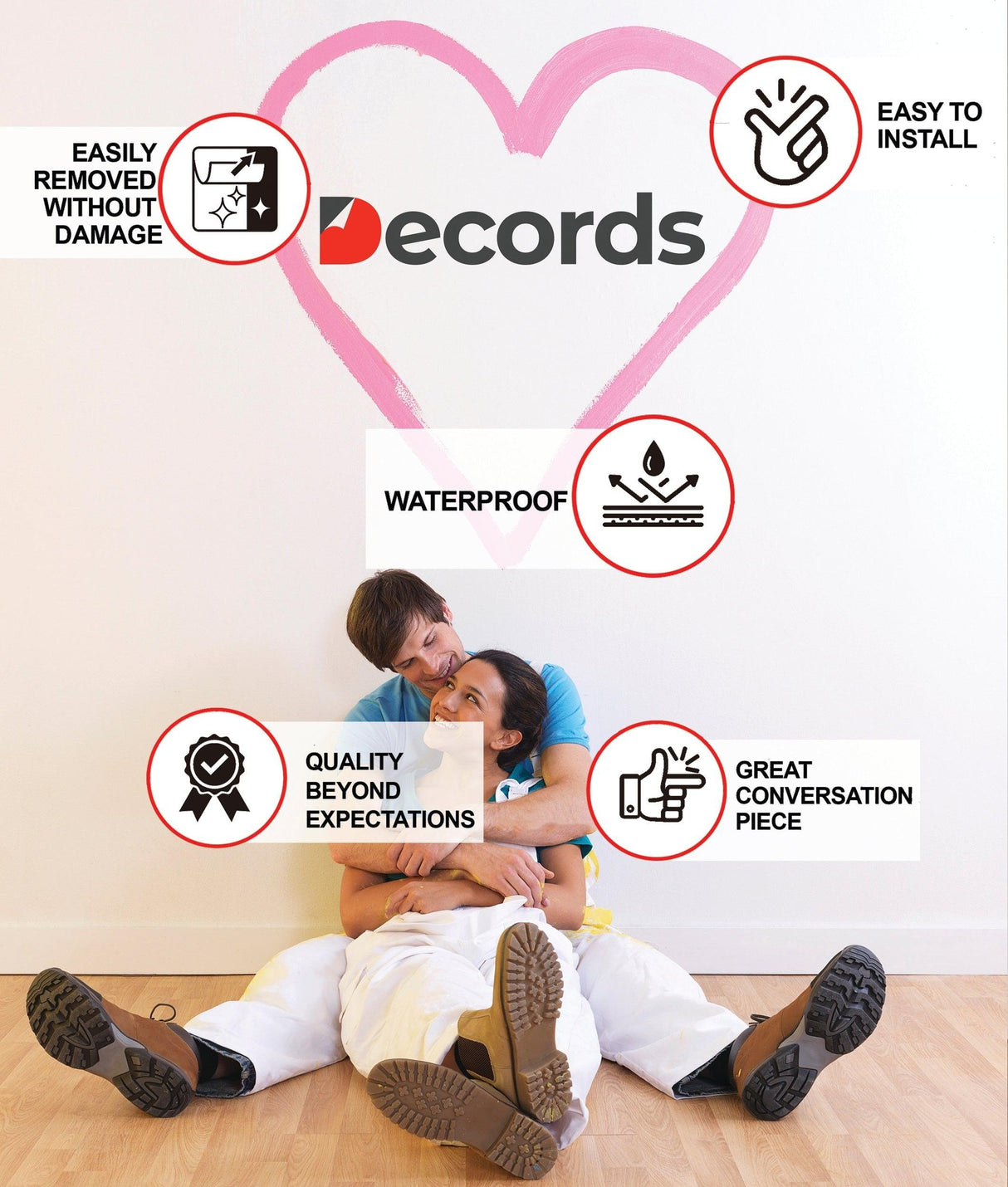 Couple sitting on the floor with wall decals showcasing product features like waterproof and easy to install.