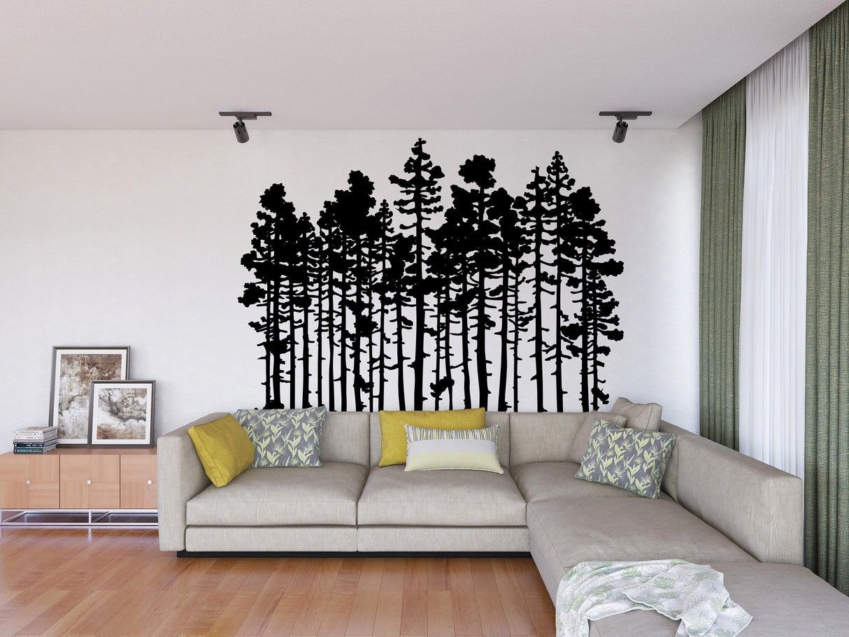 Forest Silhouette Wall Sticker in a modern living room with a light sofa and green decor.