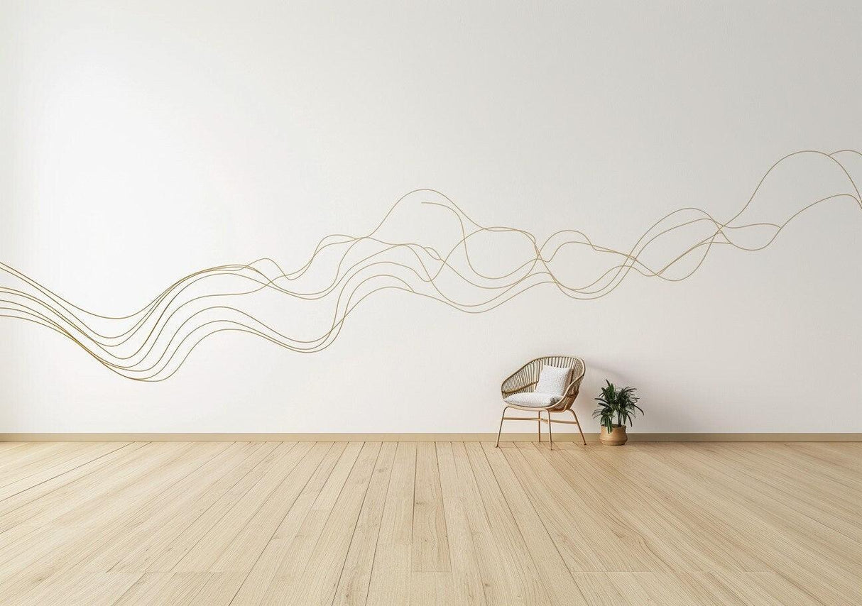 Elegant gold line art wall sticker in modern interior decor with wooden floor and chair.