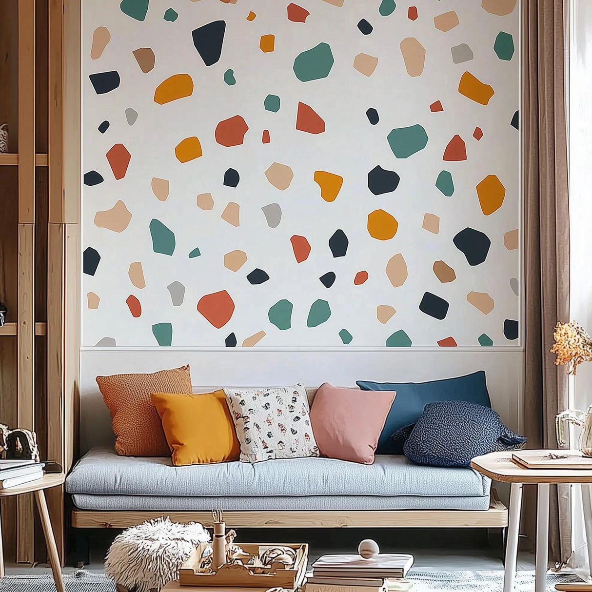 Colorful Terrazzo wall stickers in a modern kids room with cozy sofa and playful decor.