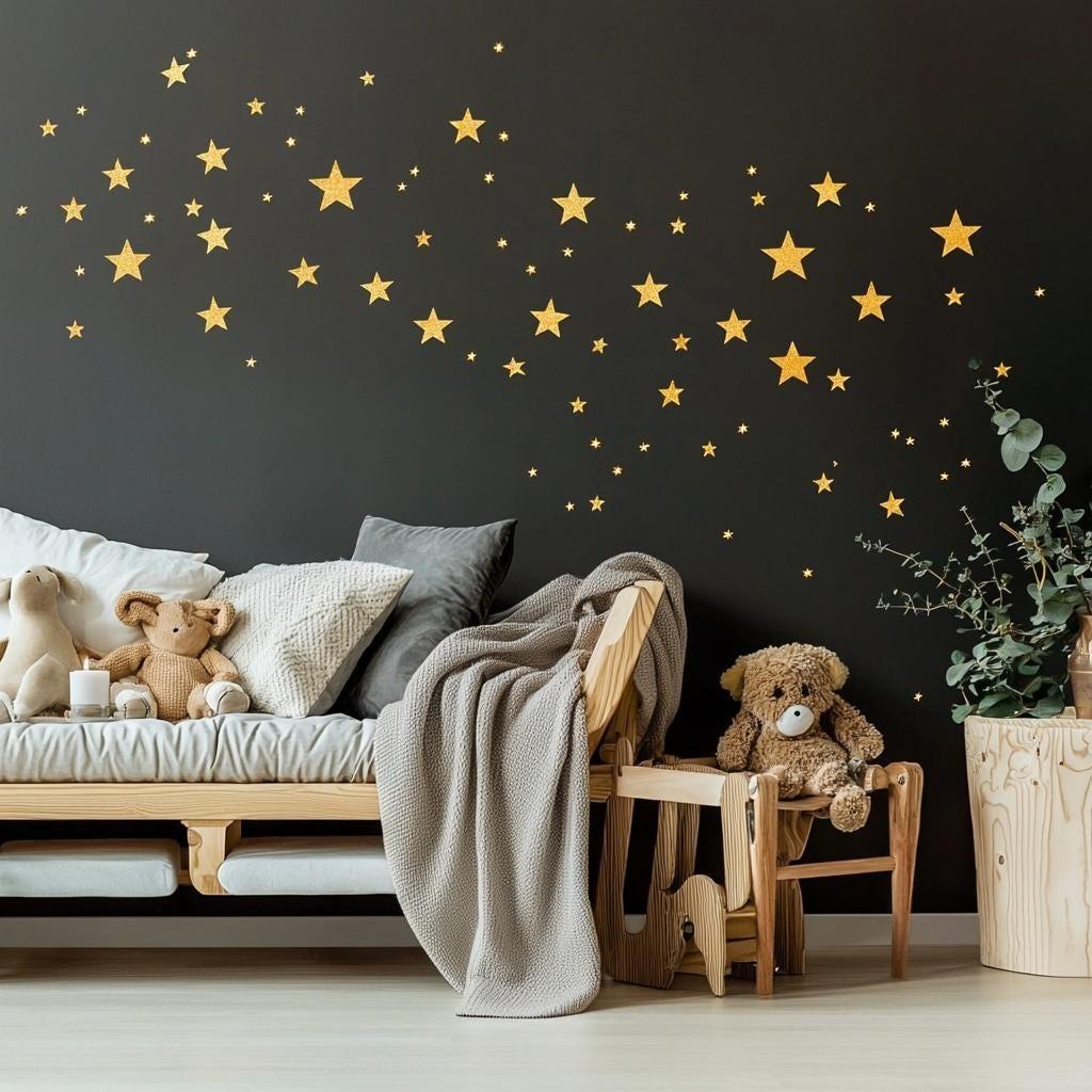 Cozy living room with gold star wall decals against a dark wall, featuring stuffed animals and a warm blanket.