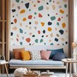 Colorful terrazzo wall stickers in a modern kids room, with playful shapes adding a whimsical touch to the decor.