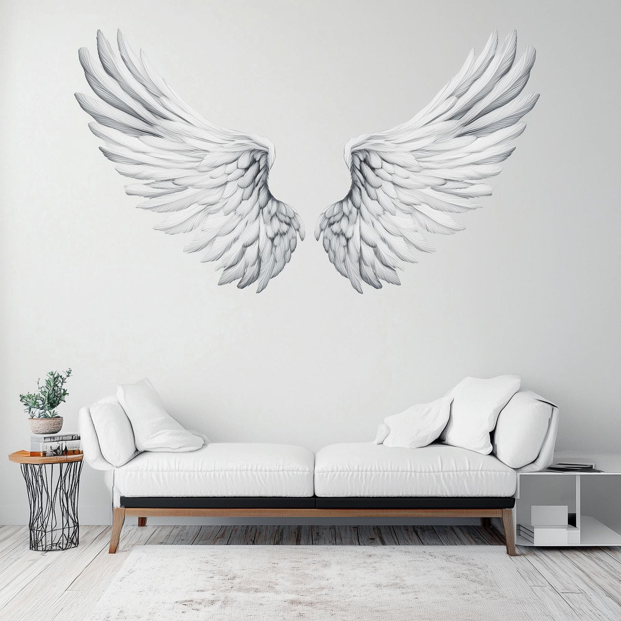 Elegant large angel wings wall decal in minimalist living room decor with white sofa.