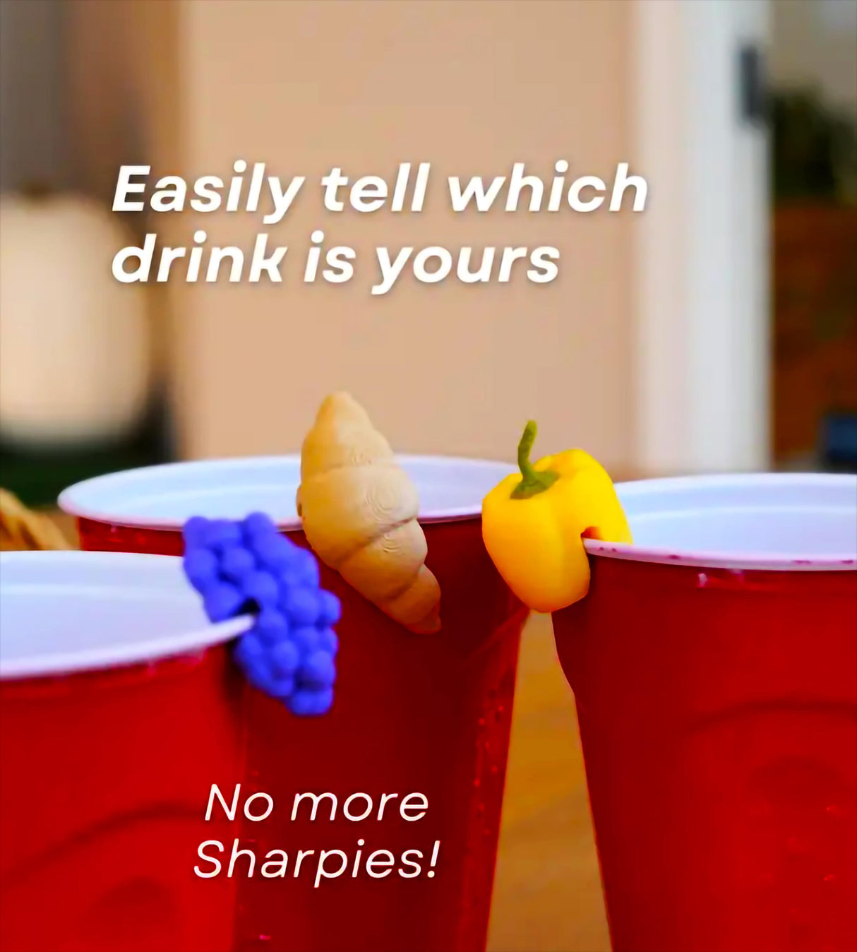 Colorful fall-themed drink markers on red party cups, highlighting festive drink identification for gatherings.