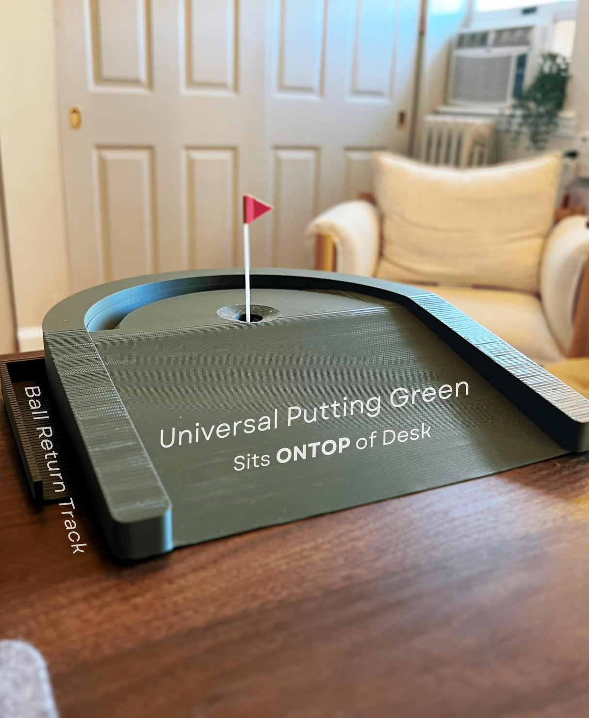 Universal putting green desktop golf game with ball return track, perfect for fun desk distraction.