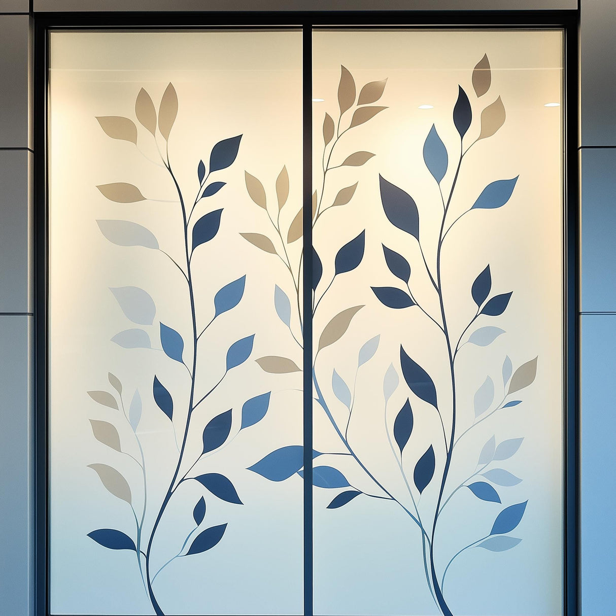 Frosted glass decal with multi-color leaf design on window, providing privacy and decorative touch.