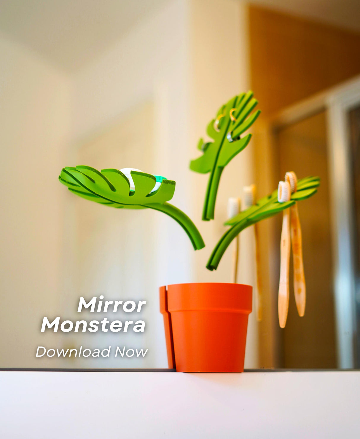 Mirror Monstera Organizer featuring green leaves in a decorative pot, perfect for bathroom space-saving storage.