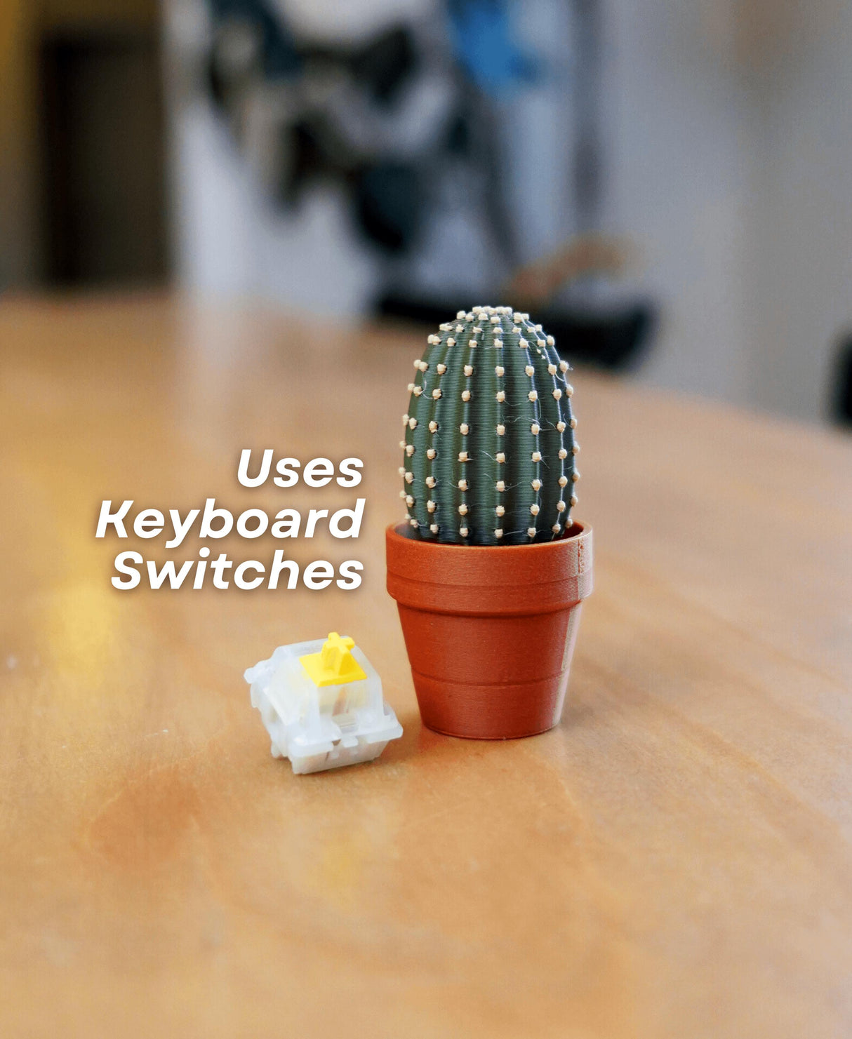 Mini Clickable Cactus toy in a pot, using keyboard switches for a fun fidgeting experience, perfect for desk decor.