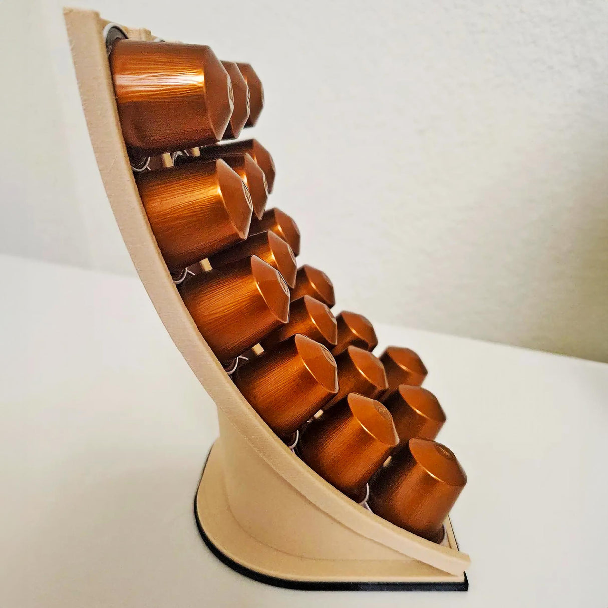 3D printed Nespresso coffee capsule holder displaying multiple coffee pods in a sleek, modern design.