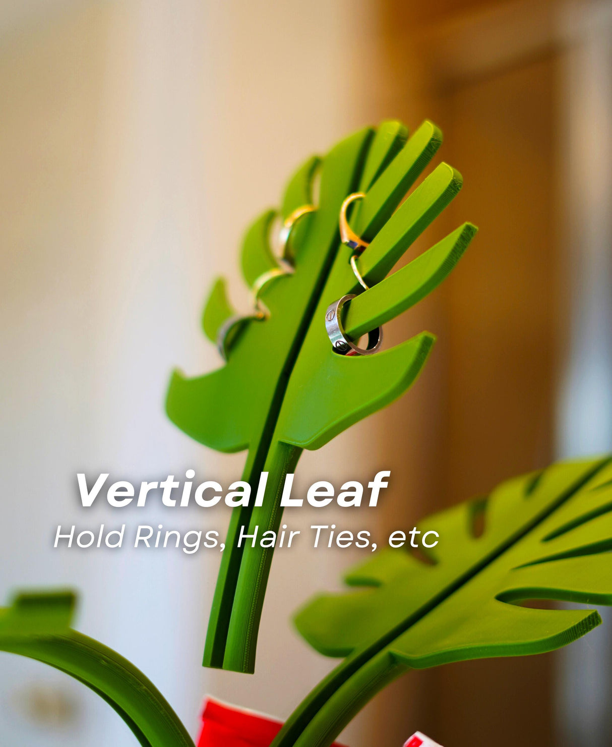 Close-up of Vertical Leaf from Mirror Monstera Organizer, ideal for holding rings and hair ties.