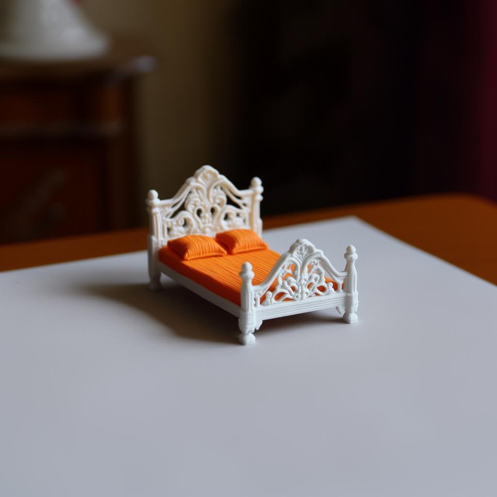 French-style miniature double bed in white with orange bedding, perfect for 1:12 scale dollhouse decor.