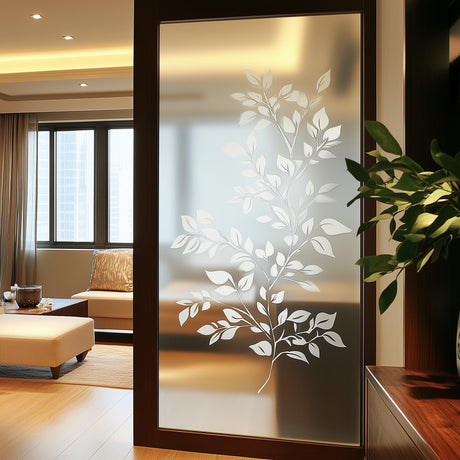 Botanical frosted glass sticker with elegant leaf design on glass panel, providing privacy while allowing natural light.
