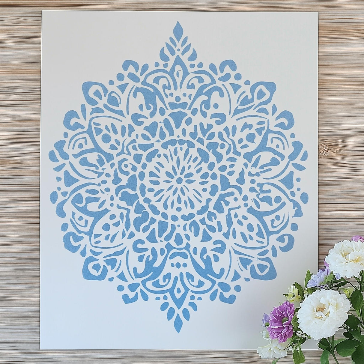 Intricate blue mandala stencil against a white background, perfect for DIY home decor, painting, and scrapbooking.