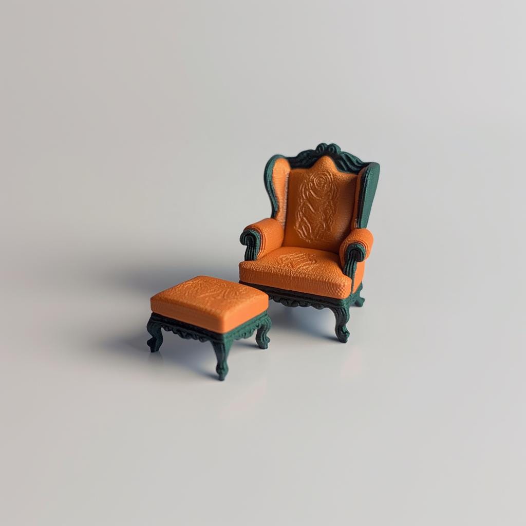 Baroque armchair and ottoman set in 1:12 scale, featuring ornate carvings and rich orange upholstery.