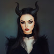 Gothic demon horns 3D printed headpiece worn by model with dark makeup and a black outfit.