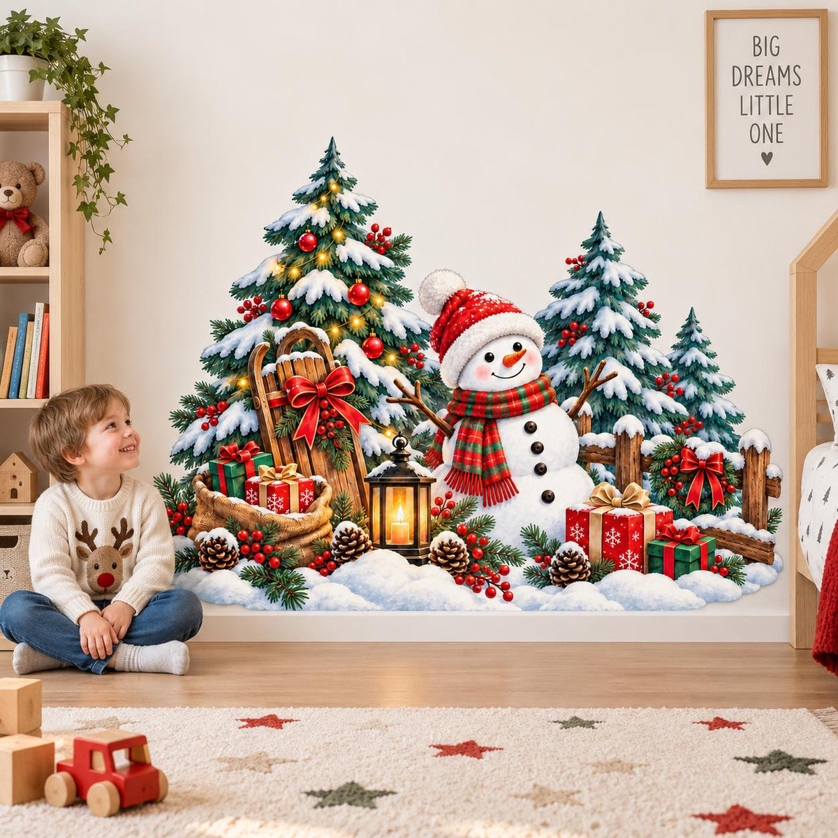 Snowman Christmas decoration featuring snow-covered fir trees, a red winter hat, striped scarf and gifts.
