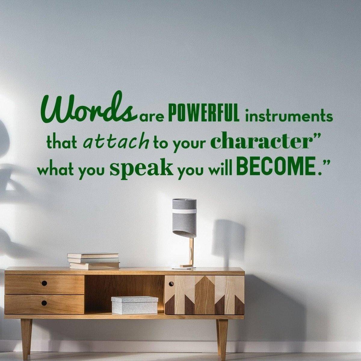 Motivational wall vinyl decal featuring quote about words and character on a smooth wall above a stylish wooden console.