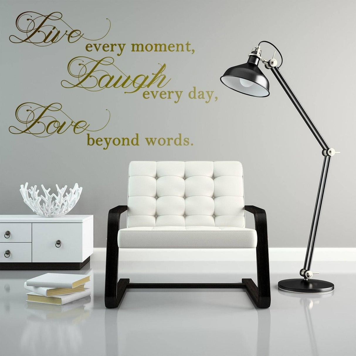 Elegant vinyl decal with 'Live, Laugh, Love' quote on a stylish wall above a modern chair and lamp.